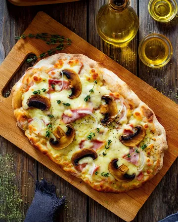  Πίνσα με ζαμπόν, μανιτάρια και μοτσαρέλα