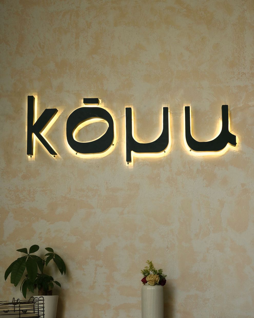 Koμu